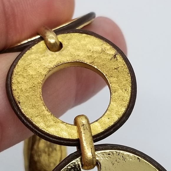 Chico's gold tone cutout disk bracelet with brown trim - Picture 3 of 5